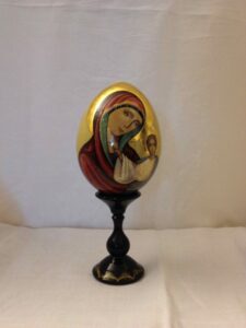 Painted wooden egg with stand