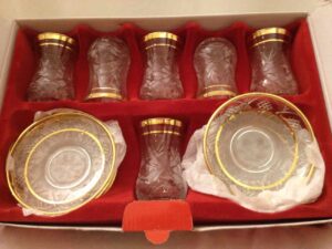 Set of six tea glasses and saucers