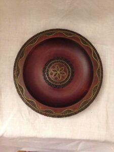 Small carved wooden plate