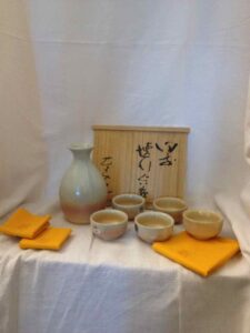 Sake set of a bottle and five cups