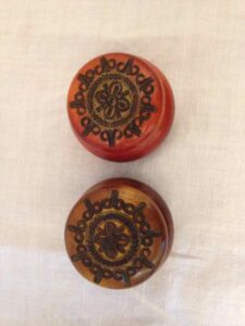 Two round wooden boxes