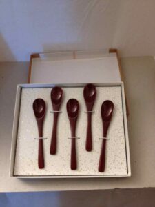 Set of five wooden lacquered spoons