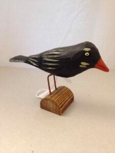 Carved wooden crow