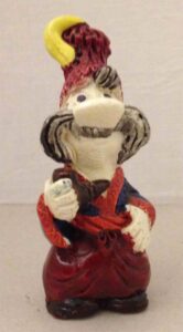 Figurine of a man holding a pipe