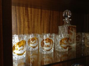 Decanter and twelve cut crystal glasses