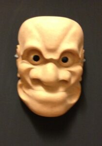 Partially finished noh mask