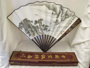Folding fan in lacquered wooden box