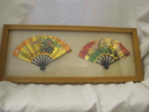 Framed pair of miniature folding fans