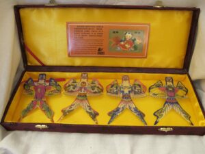Set of four miniature Weifang kites in a box