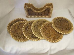 Set of six coasters in a holder