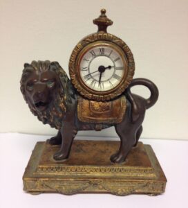 Clock mounted on a lion