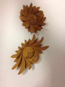 Two carved wooden lotus (?) flowers