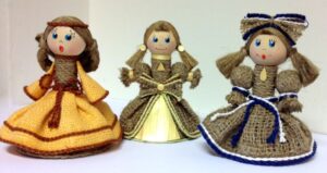 Three small dolls