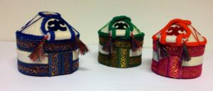 Three boxes representing Kyrgystan nomad homes