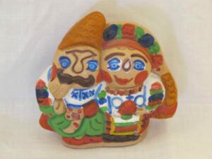 Small painted terracotta statue of a Ukrainian couple