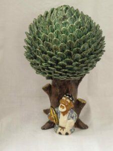 Statuette of a tree and a man