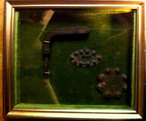 Antique door handle and escutcheon of the Palazzo Coppini