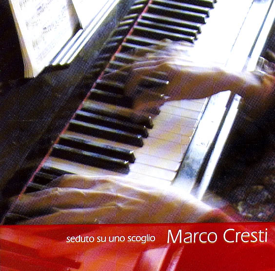 MARCO CRESTI – SEDUTO SU UNO SCOGLIO