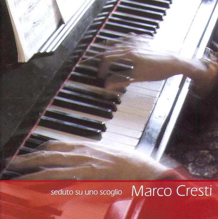 Seduto su uno scoglio