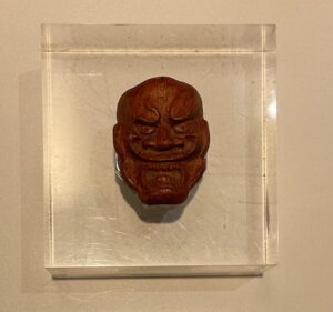 Netsuke “Devil mask”, miniature brooch